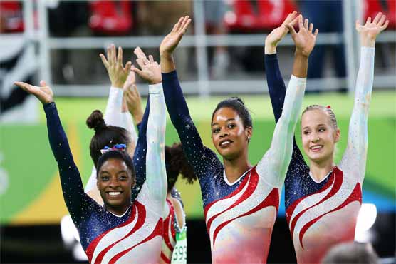 Olympics: Biles powers USA to gymnastics team gold