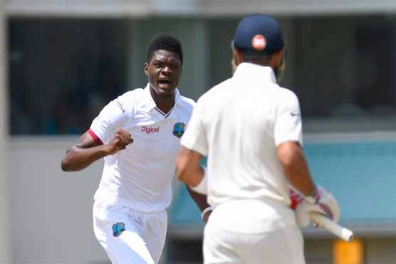 India's Ashwin and Saha dig in to halt Windies