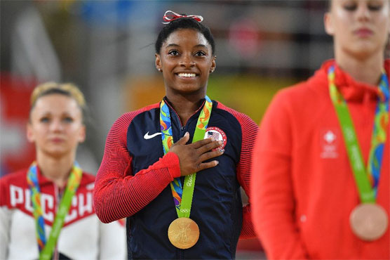 Olympics: Third gold for Biles as Whitlock outshines Uchimura