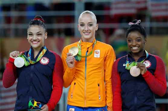Olympics: Biles's five gold bid ends as Wevers takes beam title