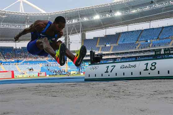 Olympics: Taylor beats love-struck Claye to triple jump gold