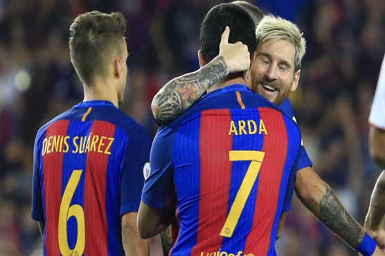 Messi and Turan help Barcelona outplay Sevilla in Super Cup