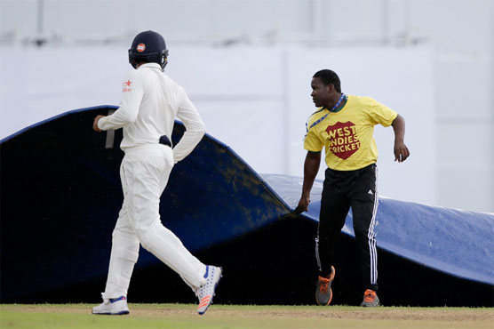 Rain intervenes after India land double blow