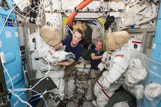 US astronauts prepare spacewalk to install new docking port