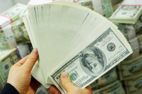 Dollar rises on Fed comments but stocks waver