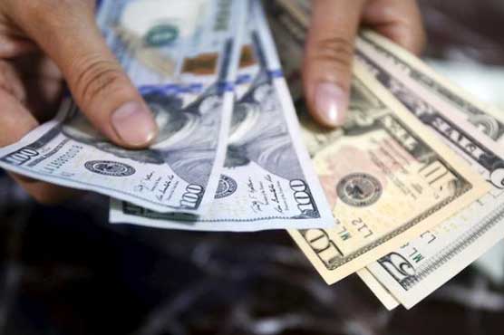 Dollar slips as market discounts US rate hike
