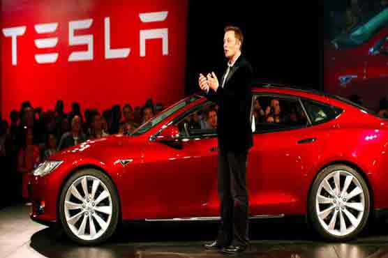 Tesla touts vehicle speed and range with new upgraded battery