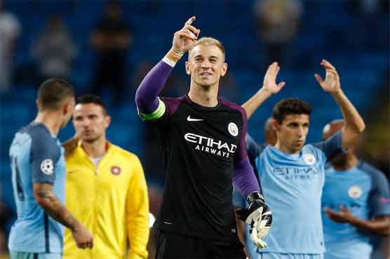 Football: Fans hail Hart as Man City reach group phase
