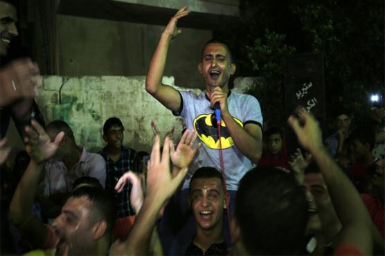 Internet star sings of Gaza cat and 'My Trousers'