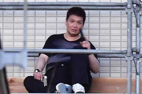 Japanese police corner suspect in deadly shooting