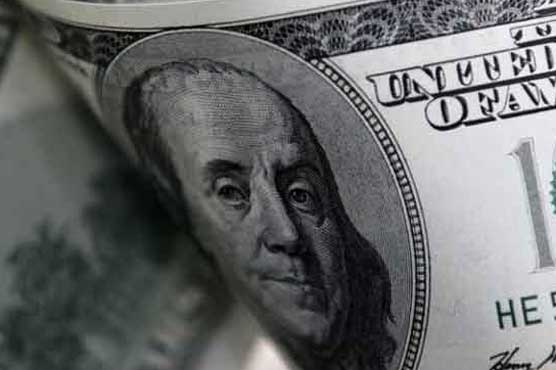 Dollar holds gains on Fed rate hike bets