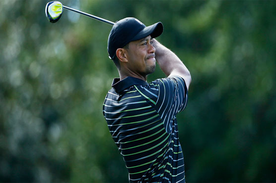 Golf: Solitary Tiger sizzles with 65 in second comeback round