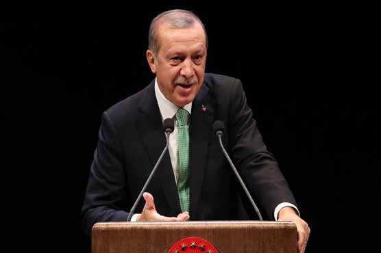 Erdogan urges Turks to convert foreign currency to lira