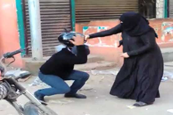 Burqa-clad woman beats man over harassment 