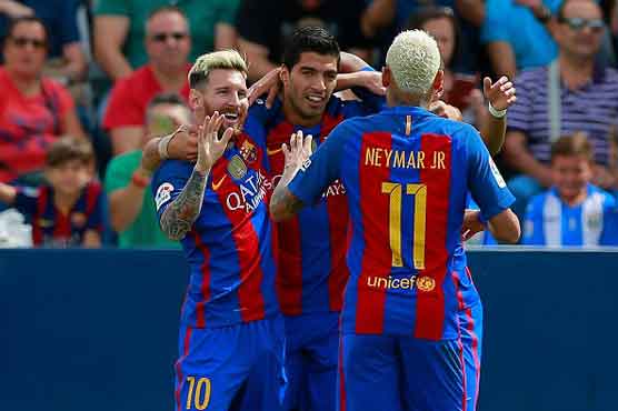 Suarez and Messi help Barcelona thrash Espanyol 