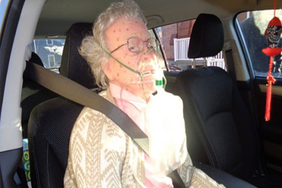 Police rescue 'frozen' woman who turns out to be mannequin