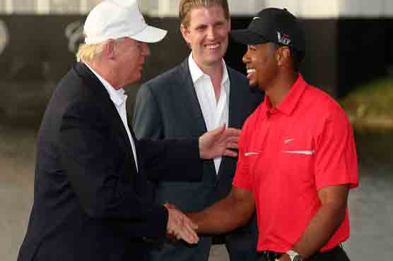Golf's Tiger Woods hits the links with Donald Trump