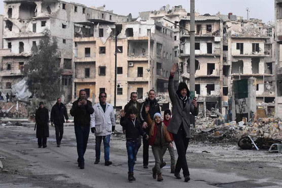 Syria army, civilians reclaim ruined Aleppo streets