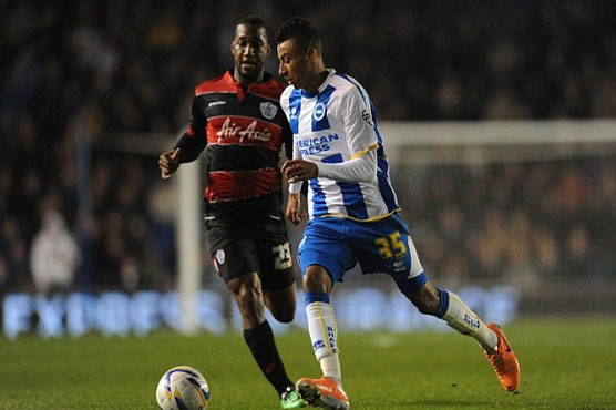 Football: Brighton sink QPR to take top spot