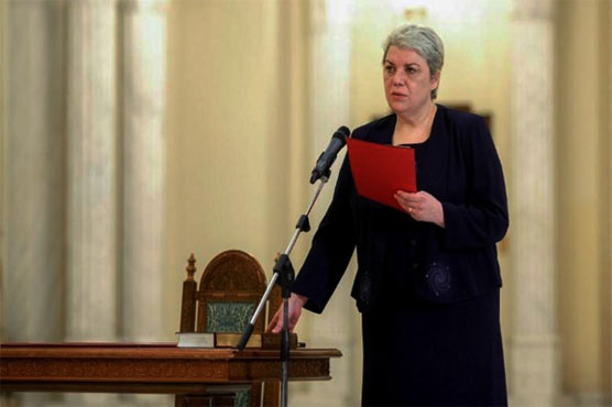 Romania's first female, Muslim PM rejected