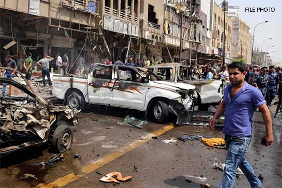 Central Baghdad blasts kill at least 18: police