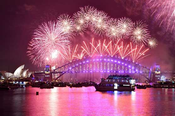 New Year revellers defy terror alerts to see in 2017