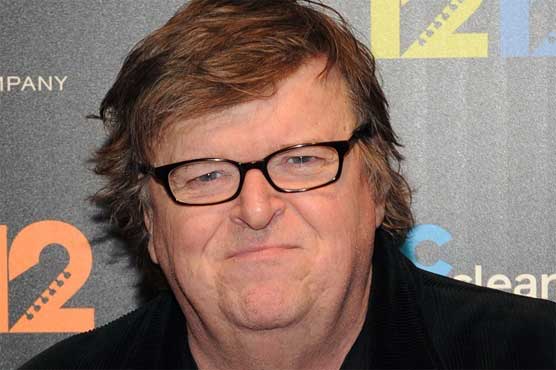 Filmmaker Michael Moore hospitalized with pneumonia