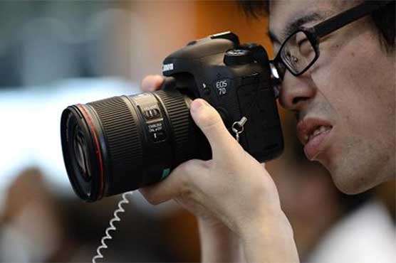 Japan camera makers battle smartphone onslaught 