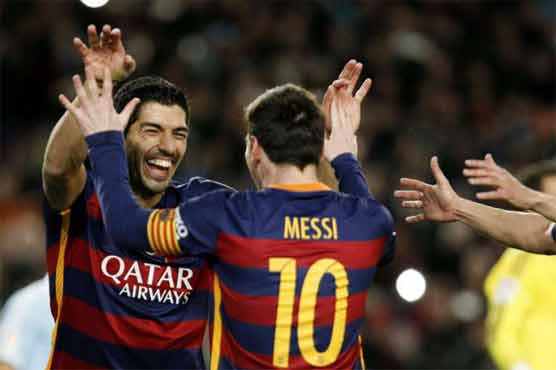 Football: Suarez, Messi penalty trick lights up Barca rout of Celta