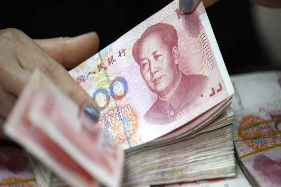 China's yuan eases after strong surge vs dollar
