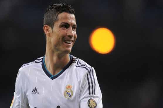 Football: Ronaldo points to Giggs, Scholes as Real target Roma win