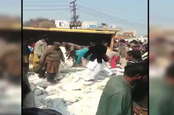 Three killed as truck carrying salt overturns at Lahore's Band Road
