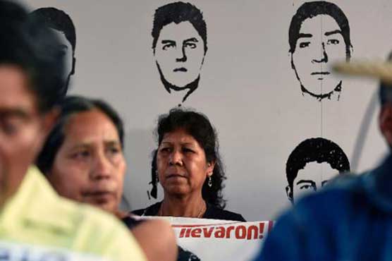 Parents of missing Mexican students skip pope's mass