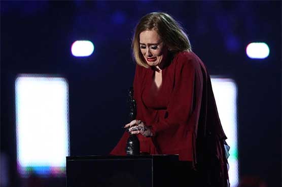 Award from outer space for Adele as Brits honour Bowie