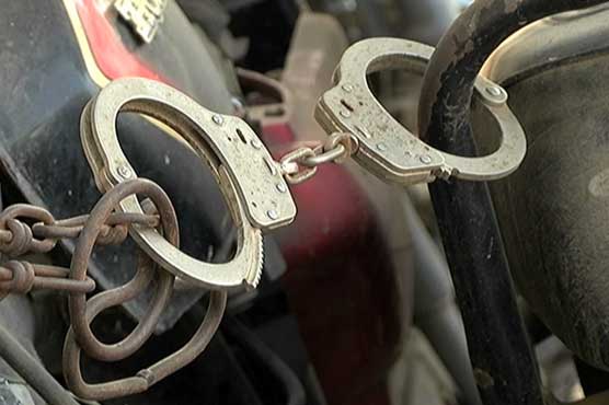 Karachi police handcuff motorcycles