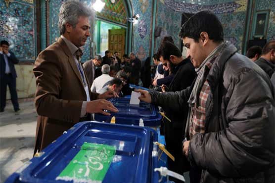 Iran votes in vital elections after nuclear deal