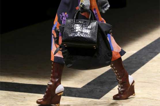 Prada offers 'see now, buy now' bags straight off the Milan catwalk
