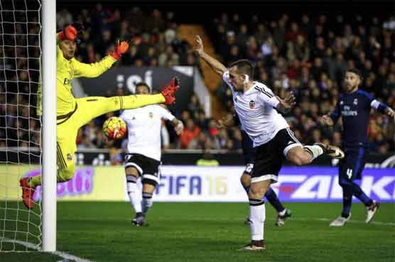 Football: Neville's Valencia fight back to deny 10-man Madrid
