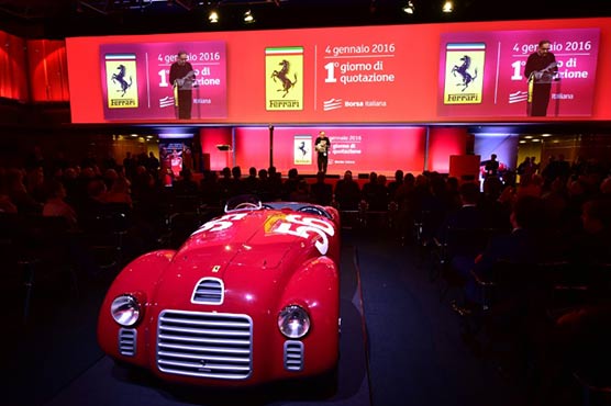 Throaty engines roar as Ferrari shares make Milan debut