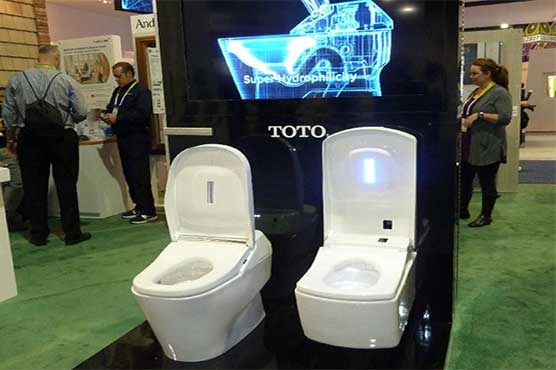 Self-cleaning toilet makes splash 