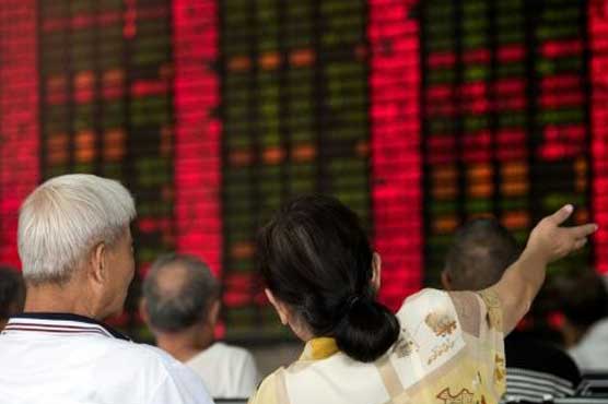 Shanghai up by break in volatile trade