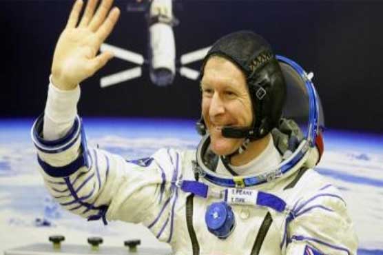 Long haul, night repairs for British, US spacewalkers