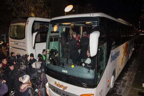 German town sends refugee bus to Merkel's office