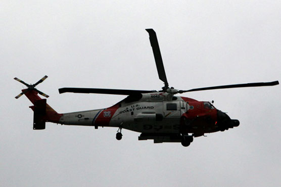 US searches for two military helicopters after reported collision