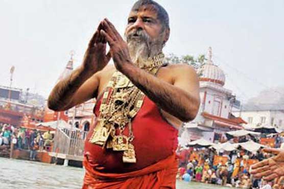 Indian 'Golden Baba' adorns himself in 15kg gold