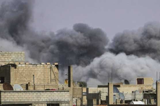 Russian air force strikes besieged Syrian city, delivers aid