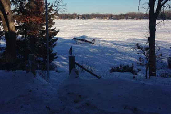 Small plane lands safely in backyard after engine ices up