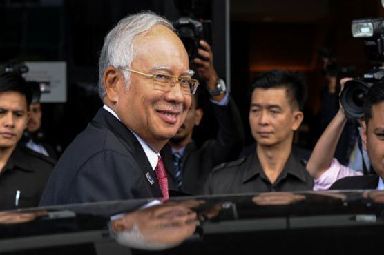 Malaysia clears PM in scandal, says Saudis provided 'donation'