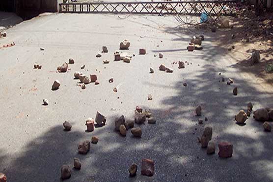 Peshawar: Angry youth hurl stones at school gate for not allowing to enter