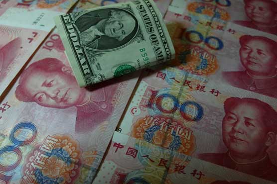 China grapples with contradictions over currency 